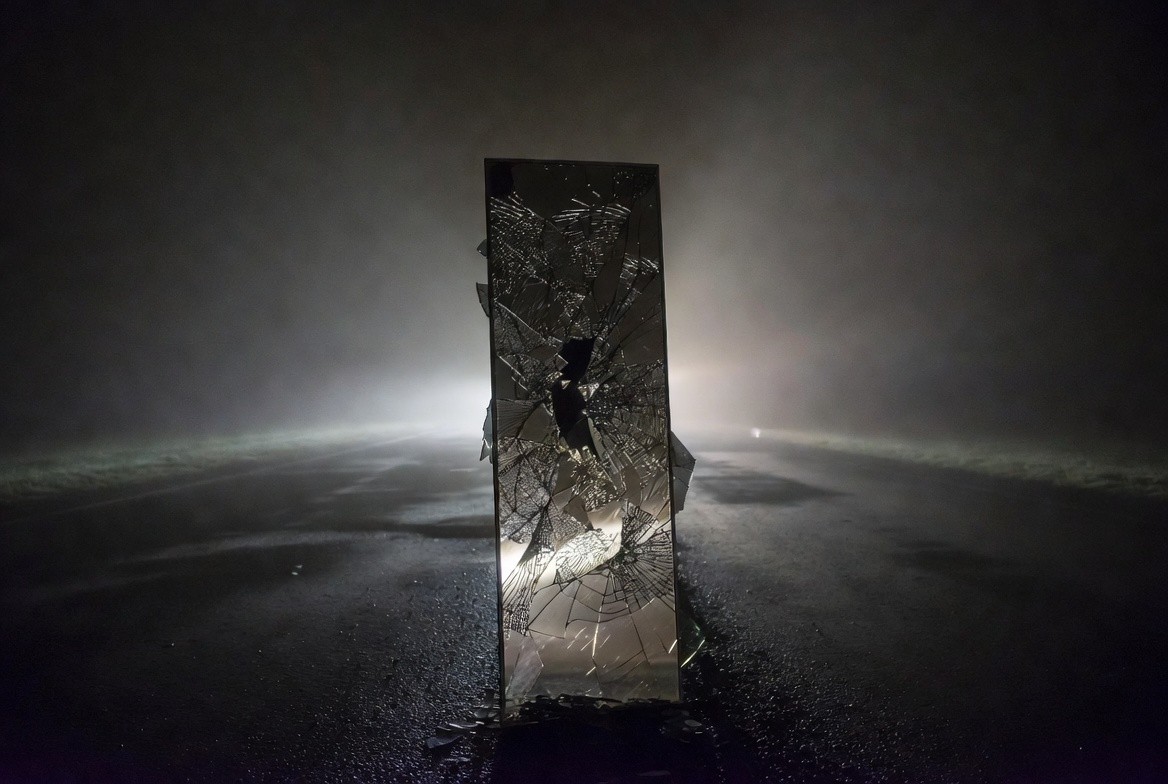 A cracked mirror